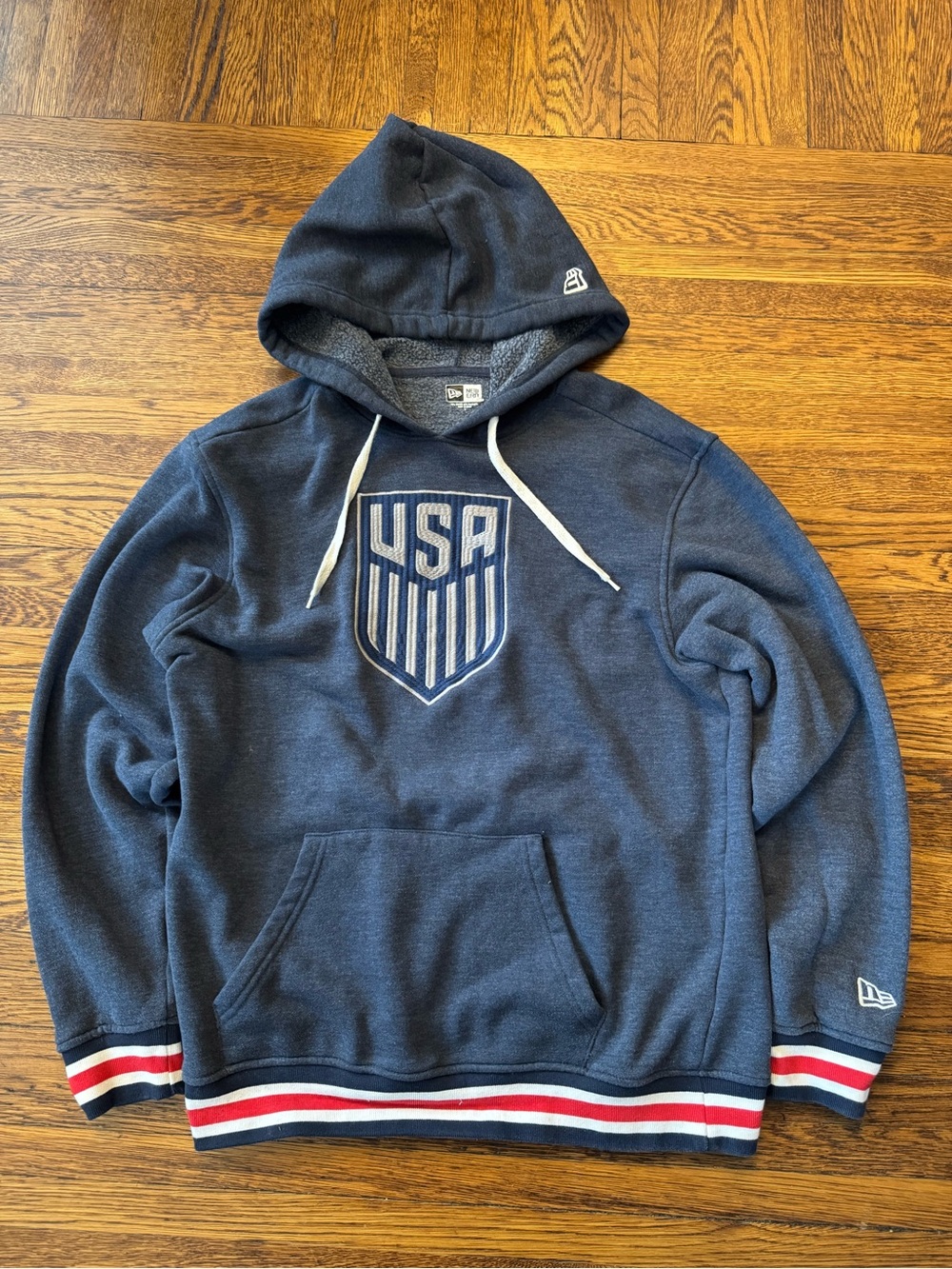 New Era USMNT throwback pullover hoodie featuring a retro USA shield crest
